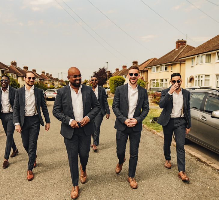 Groomsmen in Moss Bros. suits for socially distanced wedding 