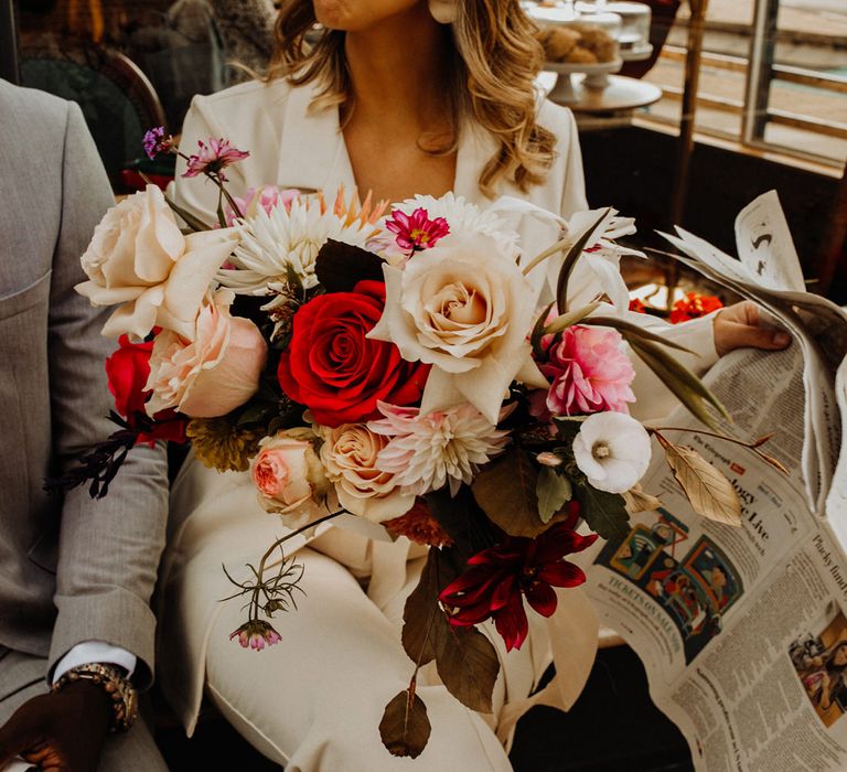 Pink, red and ivory wedding bouquet for city elopement 