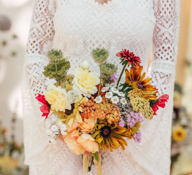 Bride & bold blooms in burnt oranges and reds