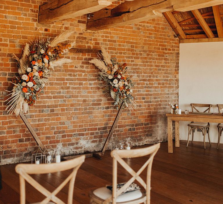 Hexagonal wedding arch at wedding ceremony