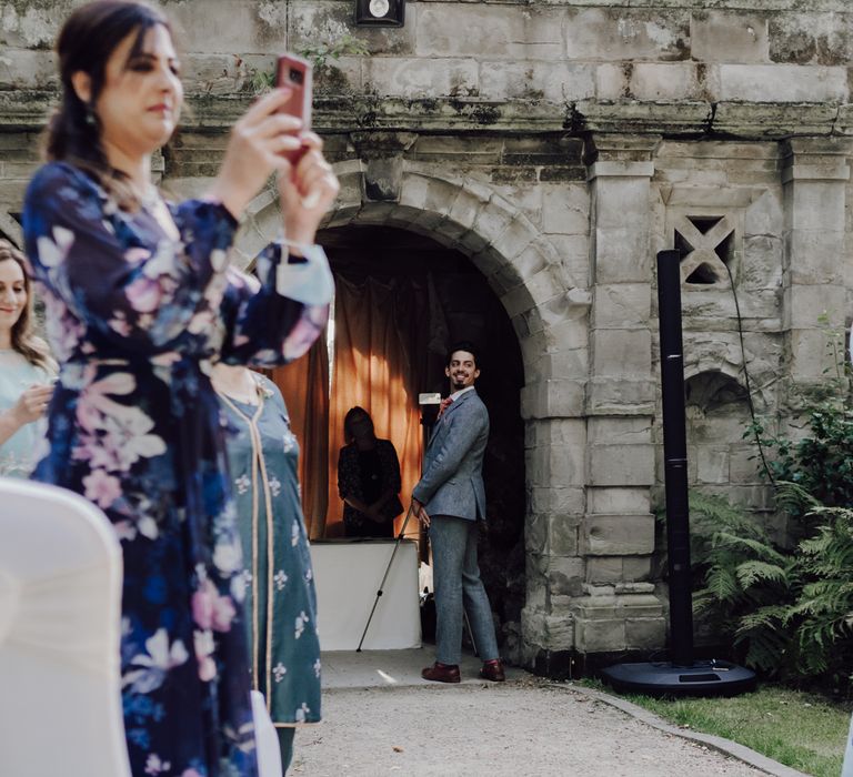 Groom waits for his bride to walk down the aisle