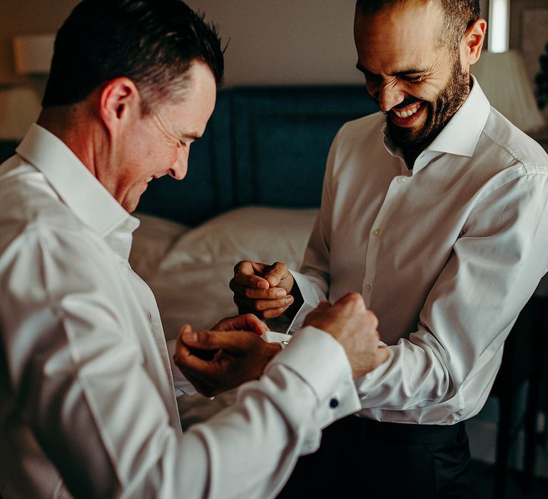 Groom gets ready for wedding morning