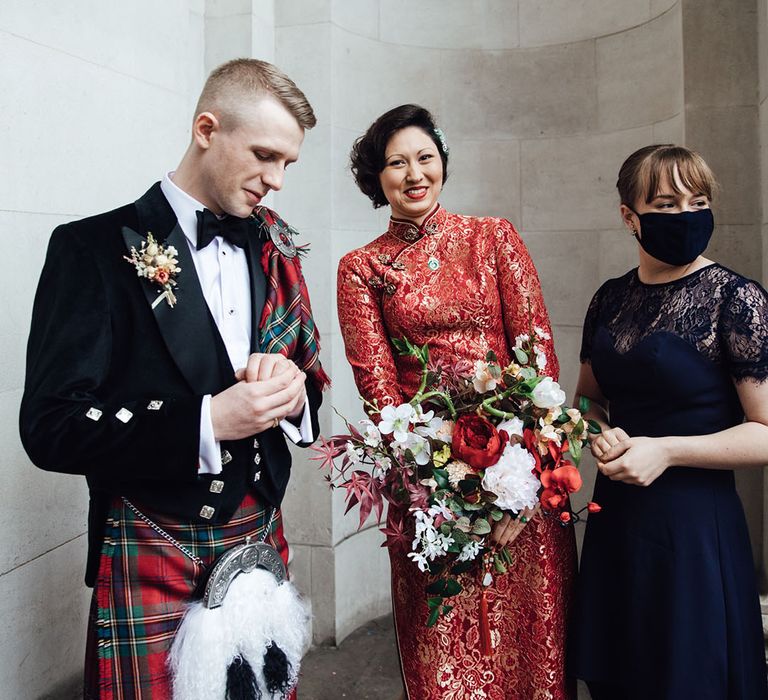 Bride and groom during intimate wedding in London