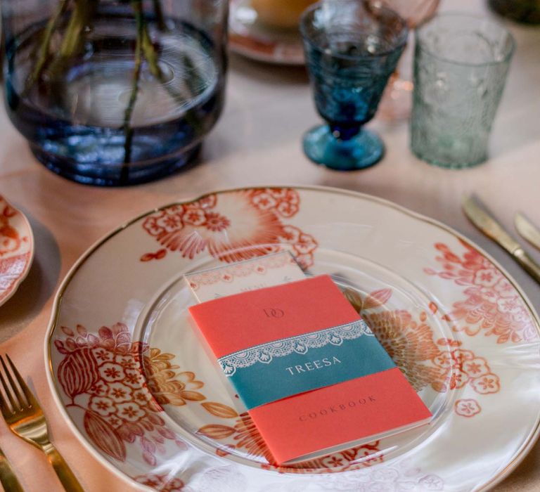 Plates with floral pattern in coral and white designed by Oscar De La Renta for Vogue 