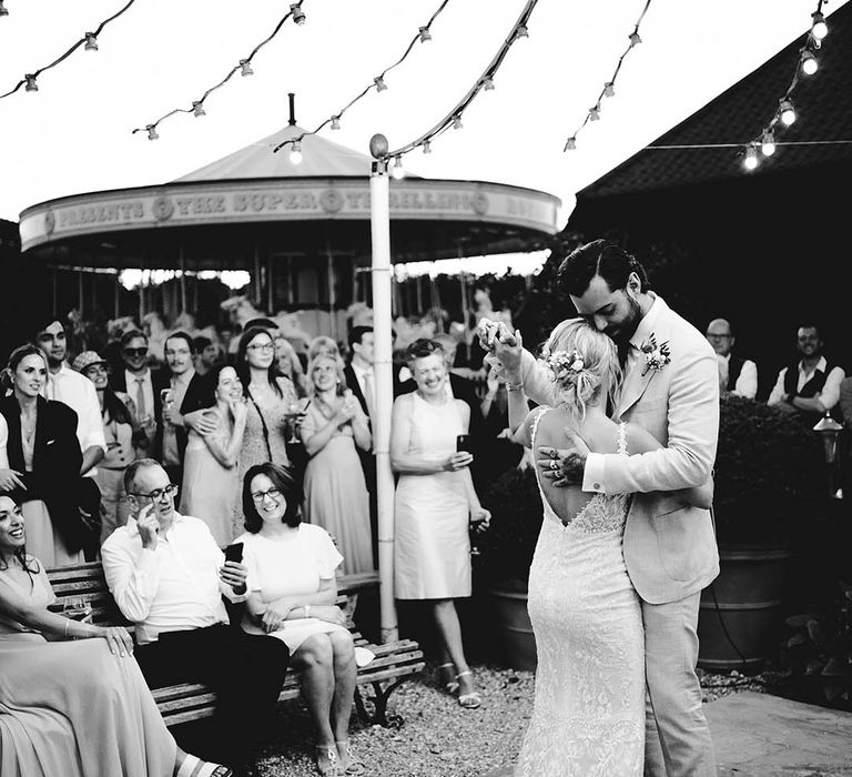 Outdoor first dance at Preston Court under a canopy of lights 