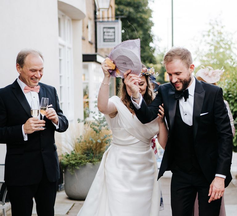 Bride & groom smash plate outside on their wedding day for Ukrainian traditions