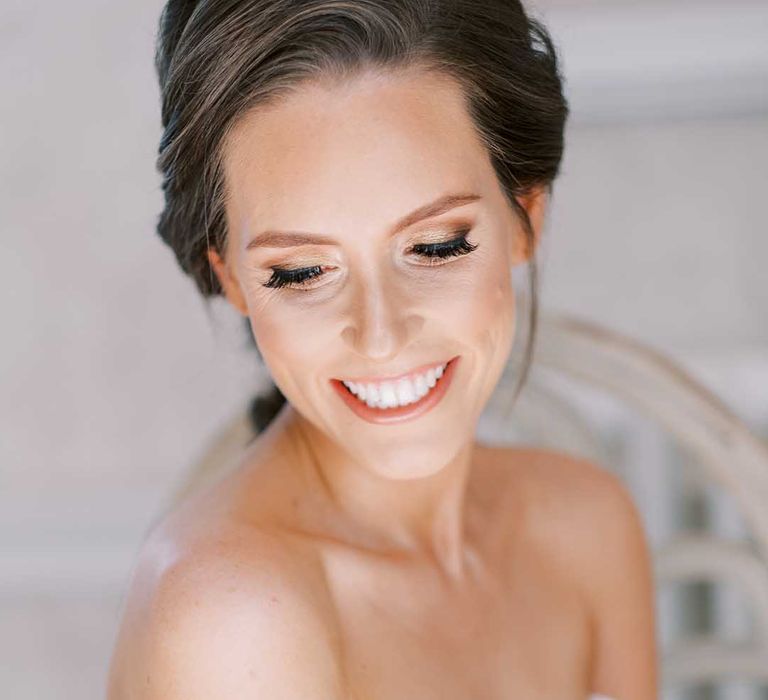 Natural wedding day makeup with lipstick and shimmering eye shadow