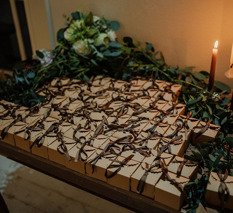 Wedding gifts with pillar candles as decoration for a rustic vibe