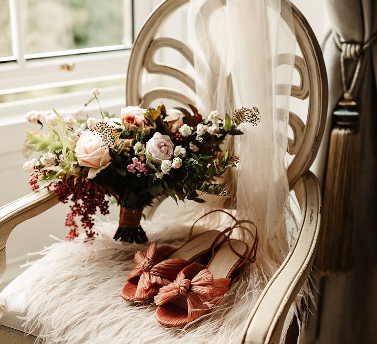 Rose and autumnal flower bouquet with Loeffler Randall wedding shoes with bow and veil 