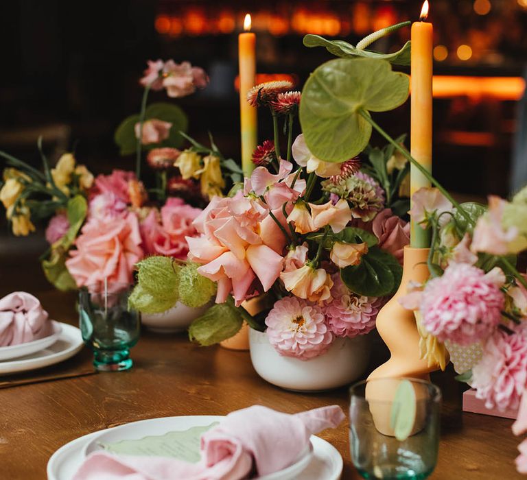 wedding flower centrepiece decor with pink and green roses, dahlias, and anthuriums 