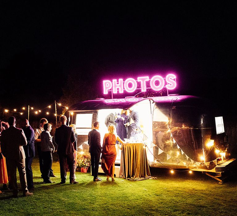 Modern wedding Photo Booth trailer with props for guests 