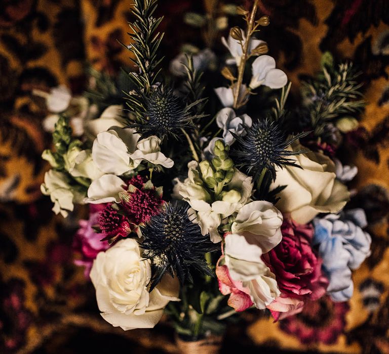 Rose and thistle wedding bouquet for the brides traditional church wedding ceremony and at home reception 