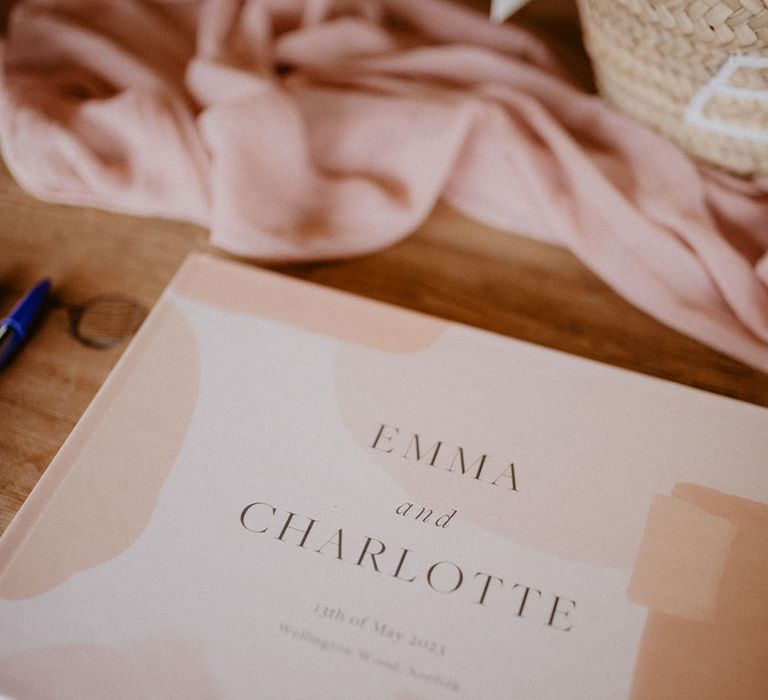 Personalised pink and white wedding guest book 