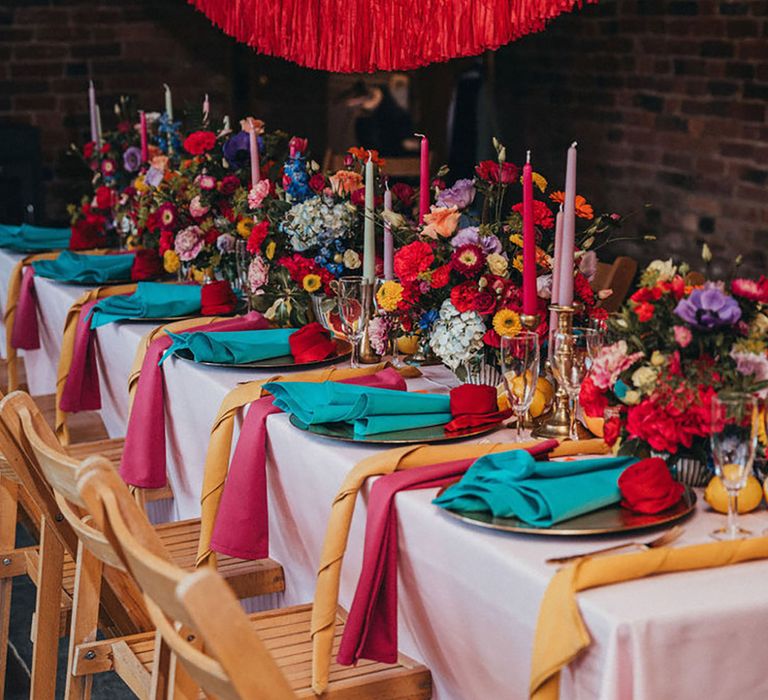 Red Wedding Streamer Decoration with Bright Place Setting & Flower Arrangements