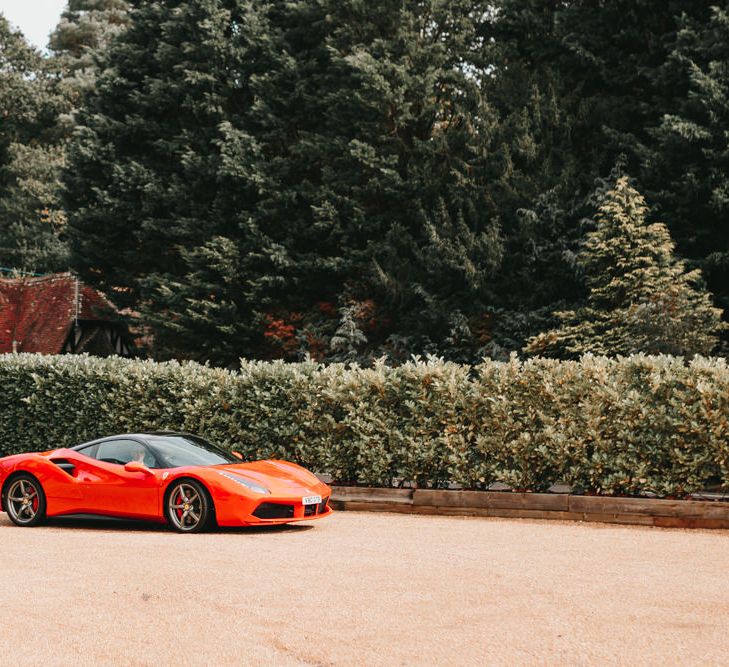 Red sports wedding car 