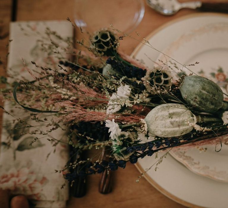 Pink and green dried wildflower bouquet for a boho inspired wedding