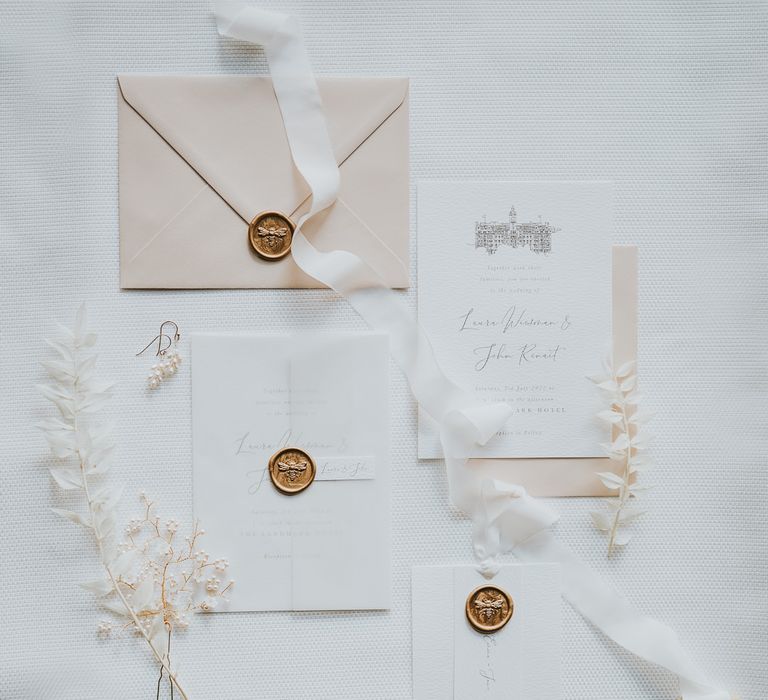 Elegant wedding stationery suit with blush pink envelope, vellum invitation and gold wax seal detail by Knock Knock Penny Studio