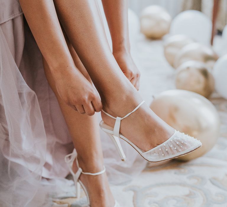 Wedding shoes with sheer toe detail covered in pearls 