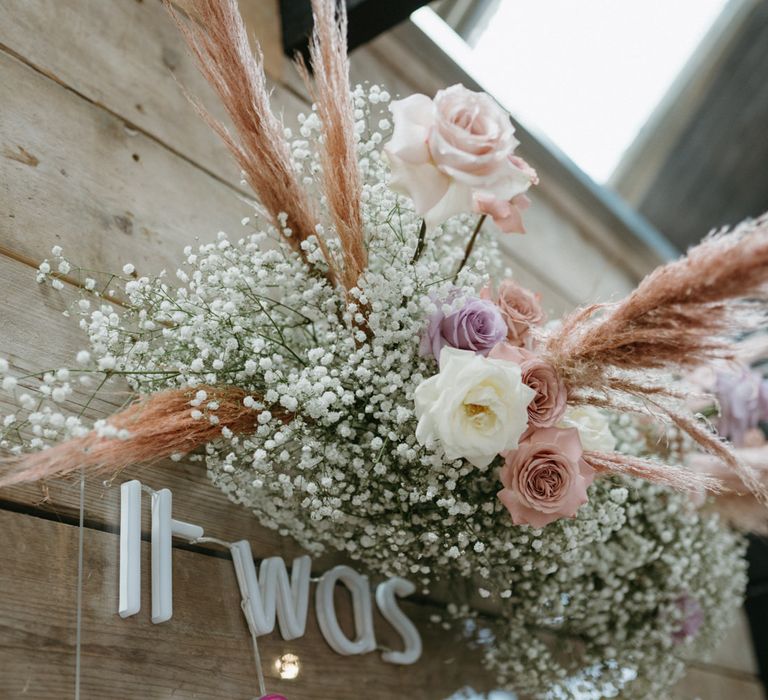 Flower cloud with gypsophila, dried grasses and pastel flowers