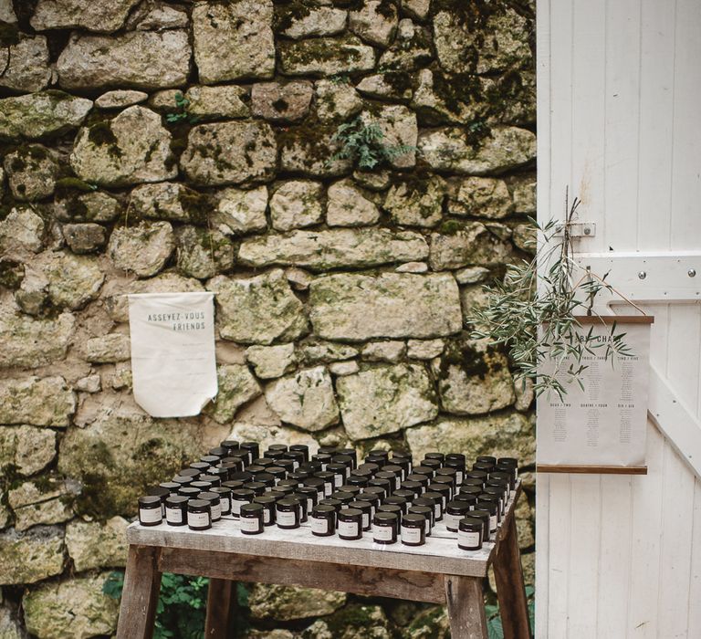 Linen hanging sign for wedding favours on table