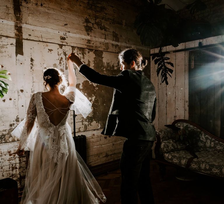 Bride and groom dancing with diamond light effect