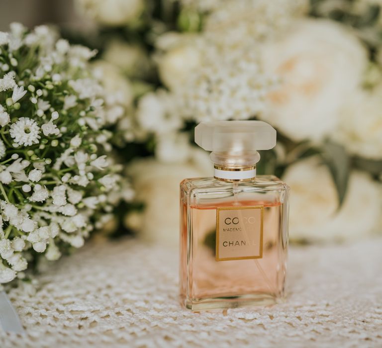 Coco Chanel wedding perfume with white wedding flowers