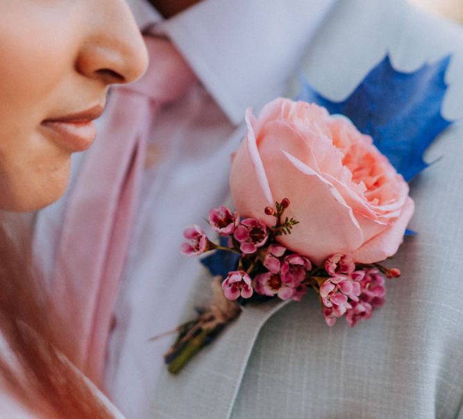 Large pink David Austen Rose groom buttonhole