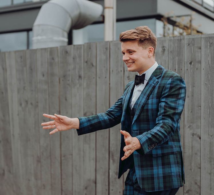 Grooms see one another for the first time in first-look moment on the morning of their wedding day | Kim Williams Weddings