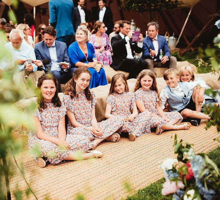 Flower girls wear floral dresses from NEXT