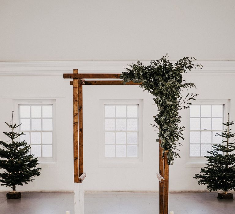 Wooden archway complete with floral decor at the Core Clapton