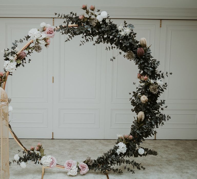 Floral archway complete with pastel florals 