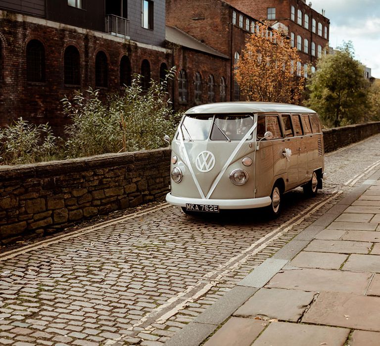 Vintage VW camper van wedding transport in pale green 