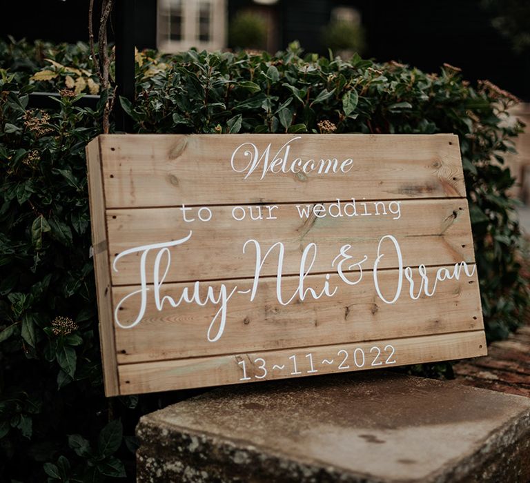 DIY wooden wedding welcome sign for a boho wedding with lots of personal touches 