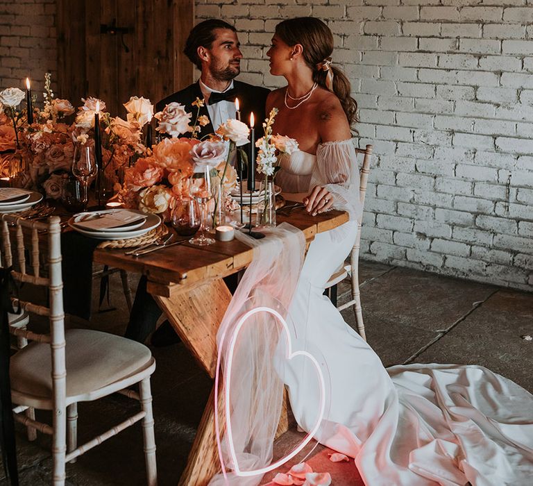 Wedding streamer decorations at barn wedding venue for rustic and industrial style wedding 