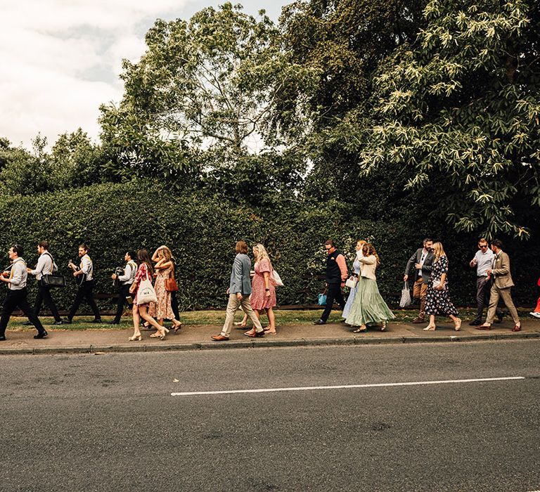 Roaming wedding band performing as the guests walk from the church to the wedding reception 