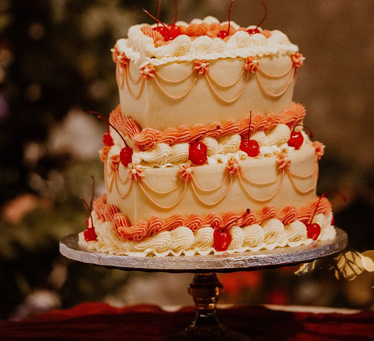 Valentine's Day wedding idea with heart shaped wedding cake with retro icing 