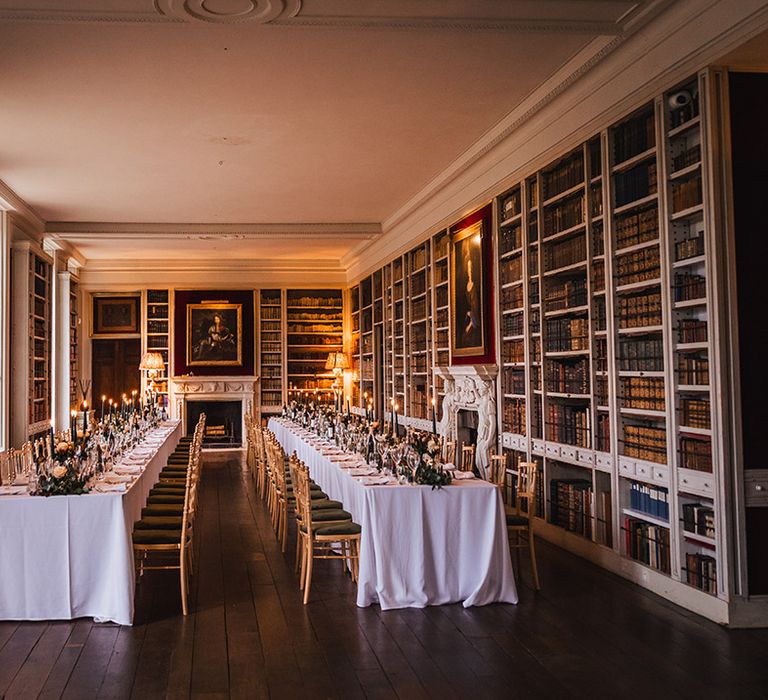 St Giles House library with long banquet tables for the wedding breakfast 