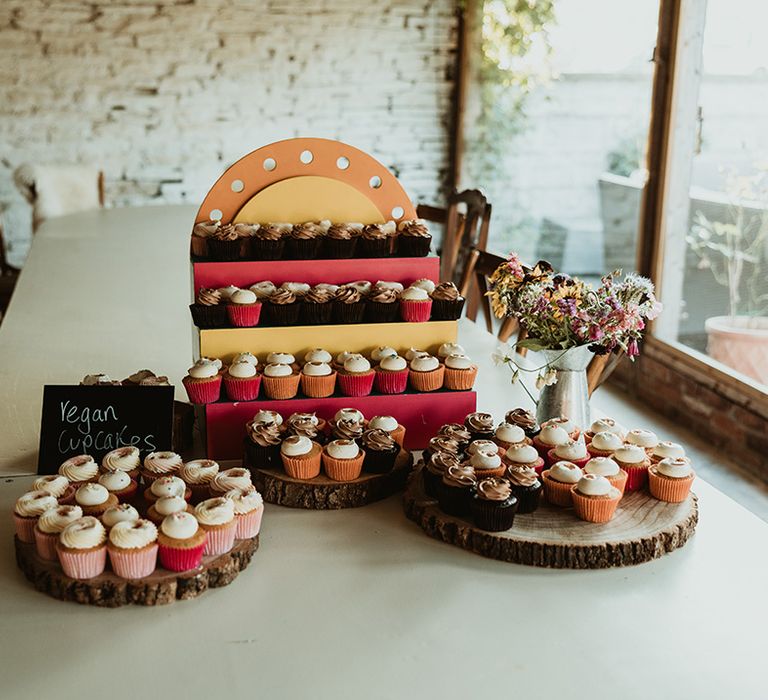 Vegan wedding dessert table station with vegan cupcakes 