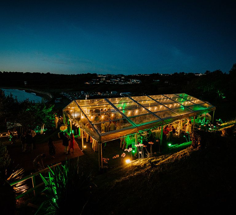 Wedding reception in glass marquee at Jersey at home weekend wedding 