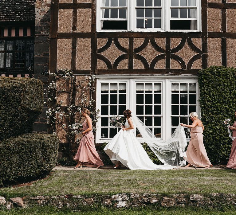 Bridal party make their way to the wedding ceremony