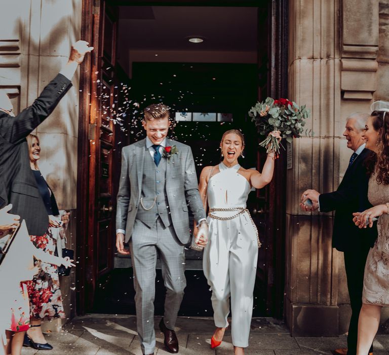 Small Town Hall micro wedding confetti exit with bride in Massimo Dutti jumpsuit 