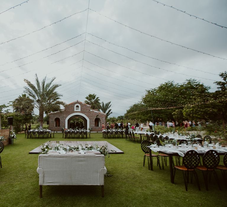 The outdoor dance floor in the centre of the wedding tables