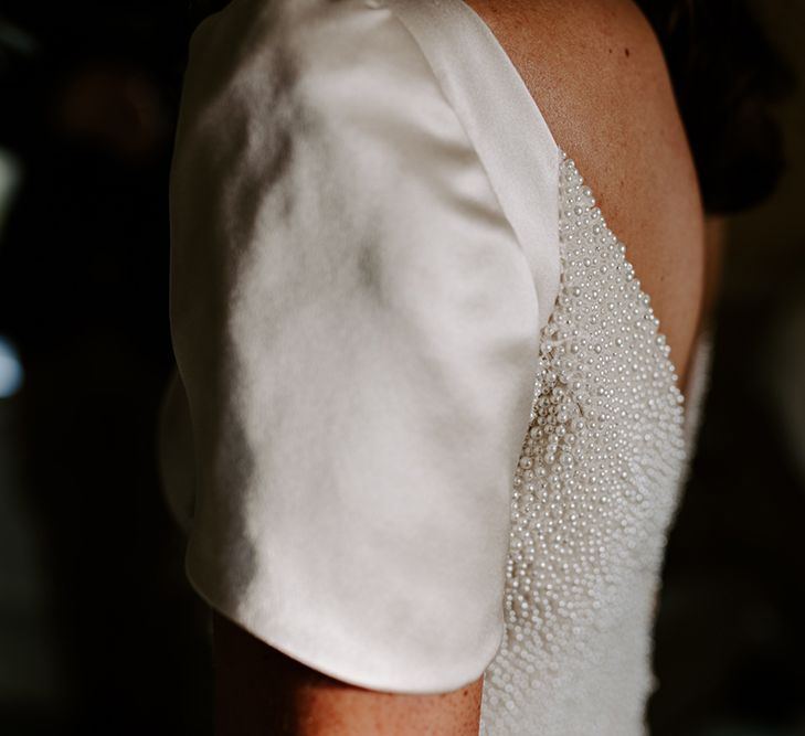 Close up details of embellished wedding dress