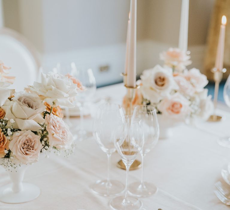 Elegant pacesetting with linen napkin and menu and place setting cards tied with ribbon 