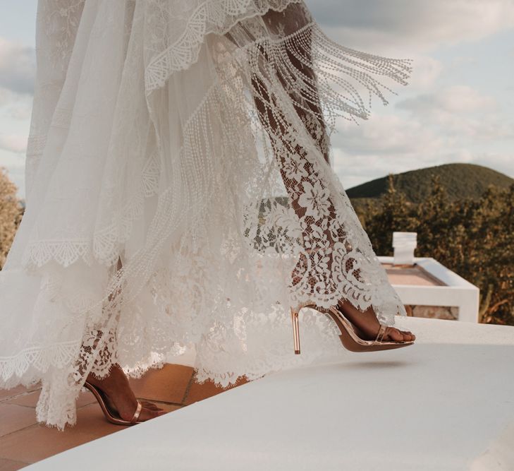 Bride in a Marylise Bridal gown with lace and tassel detail