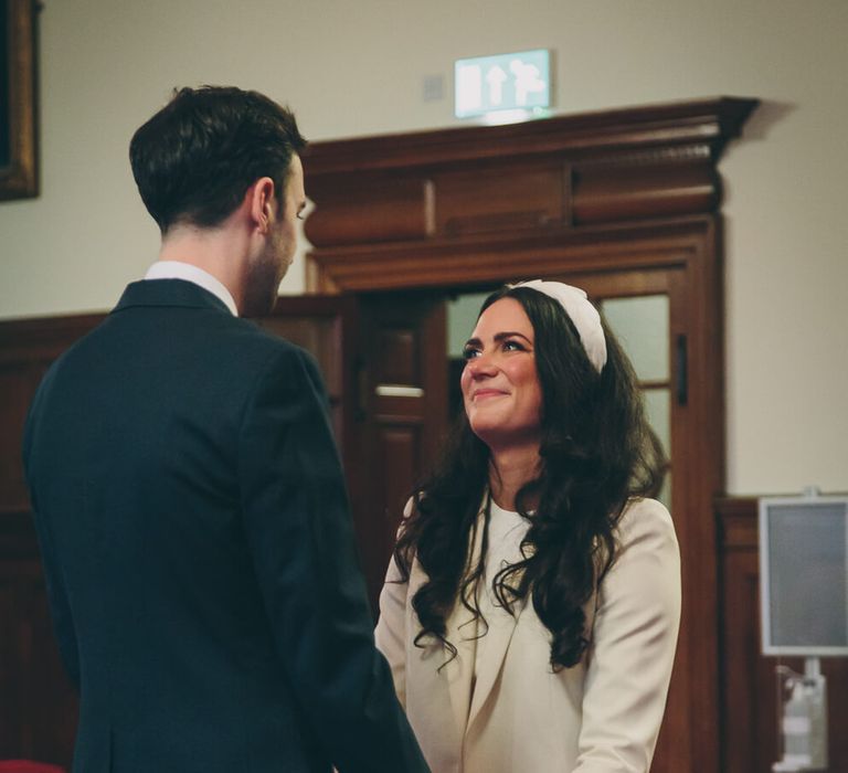 Bride and groom getting married in bath - bride wears short wedding dress