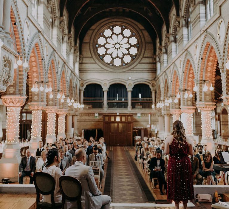  Bride & groom sit at the front of church on their wedding day | Irene Yap Photography