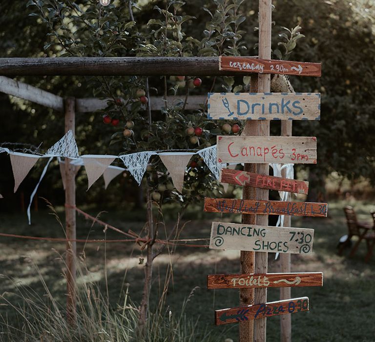 DIY festival inspired wooden wedding signage 