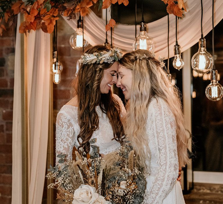 Bowers Mill wedding venue in Yorkshire with same sex couple wearing boho lace wedding dresses 