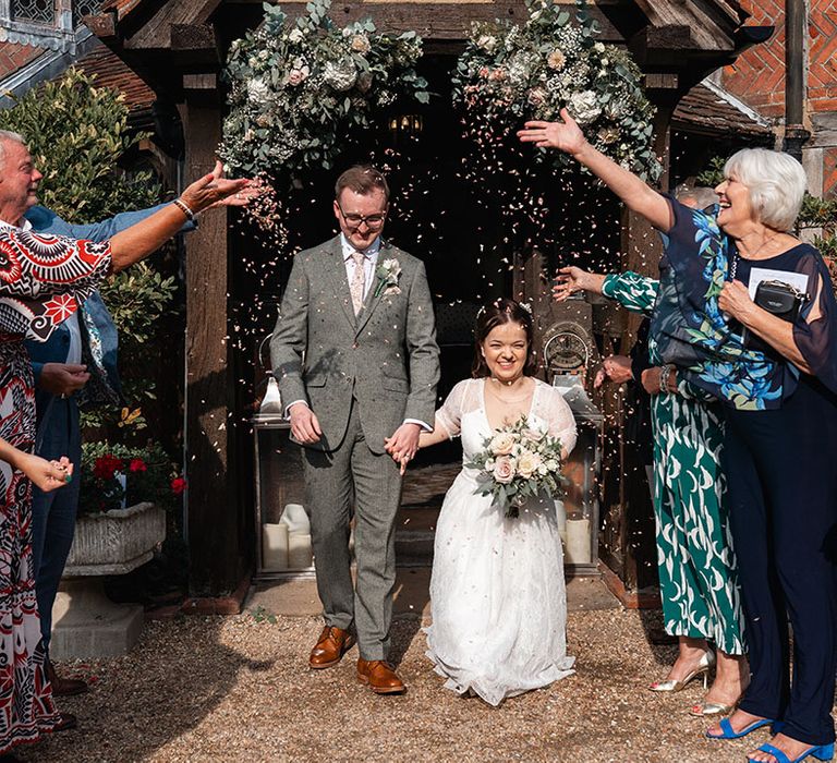 Confetti moment for the bride and groom 